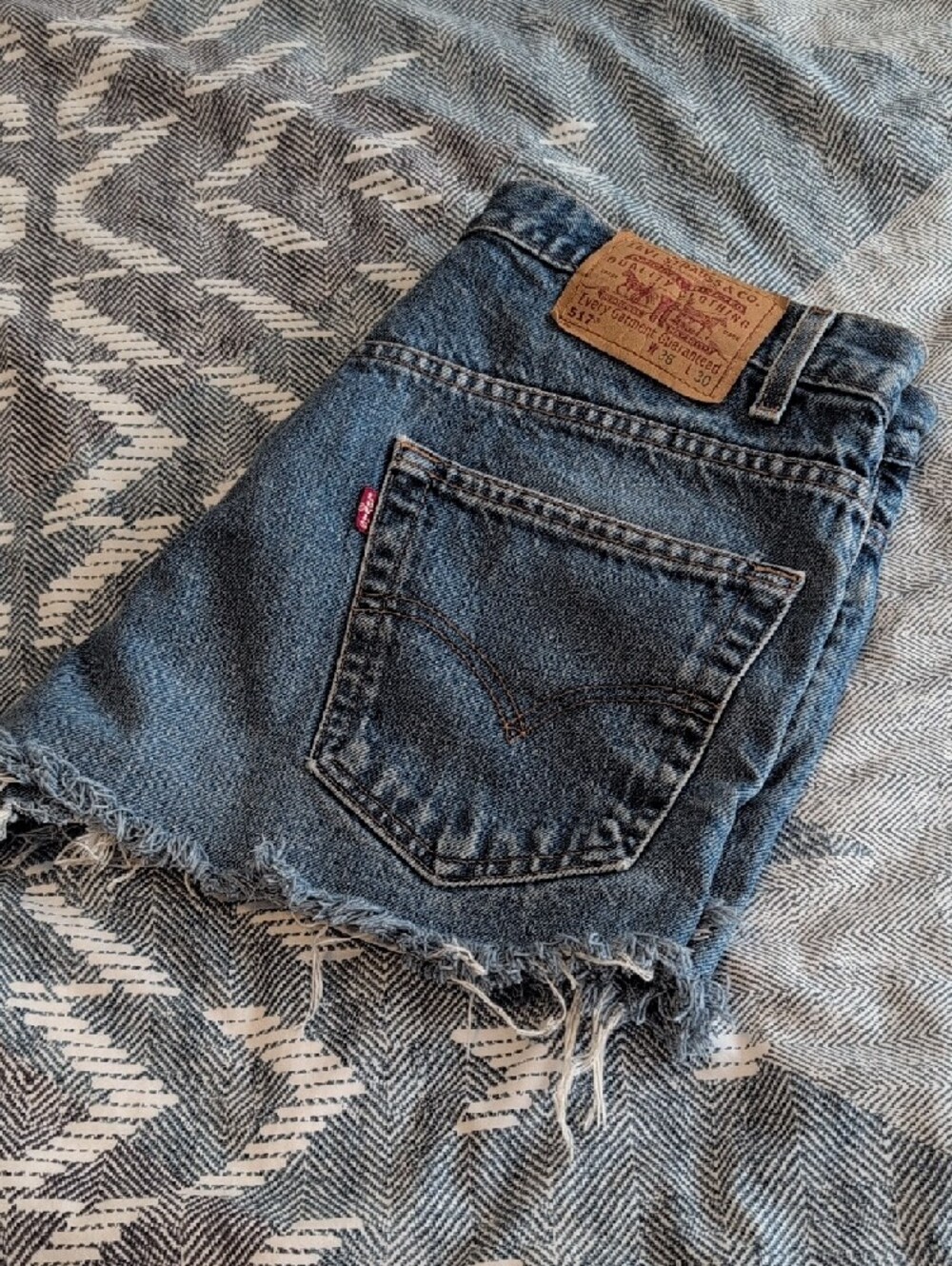Levi's Dark Blue Frayed Denim Cutoff Shorts